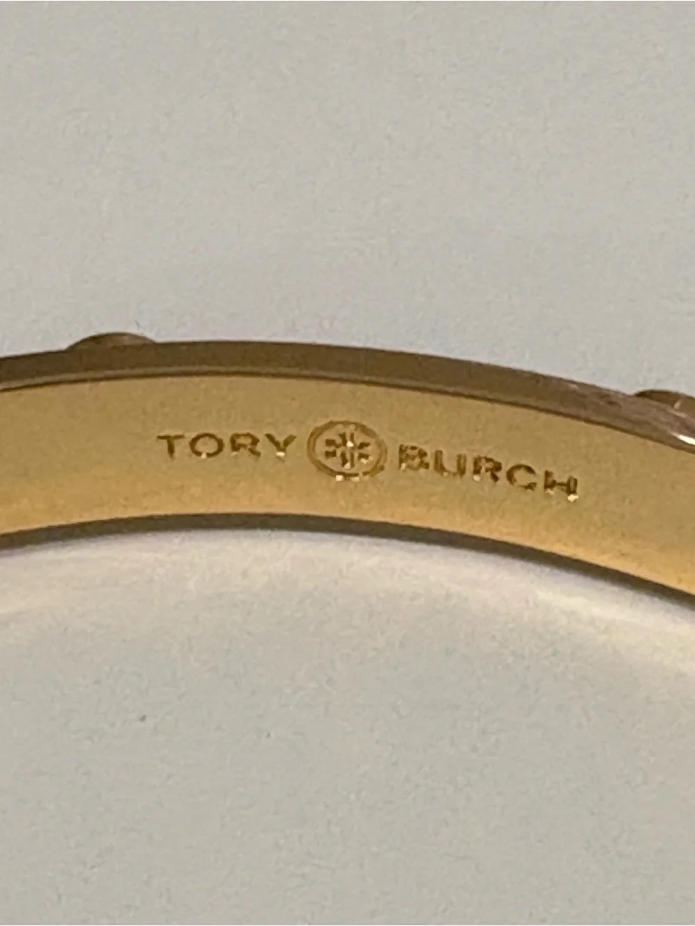 Tory Burch Black Enamel Bangle with Gold Logo Discs